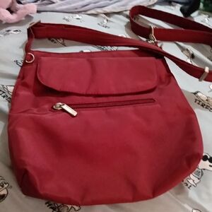 Travelon Red Crossbody Bag with Adjustable Strap and Practical Design